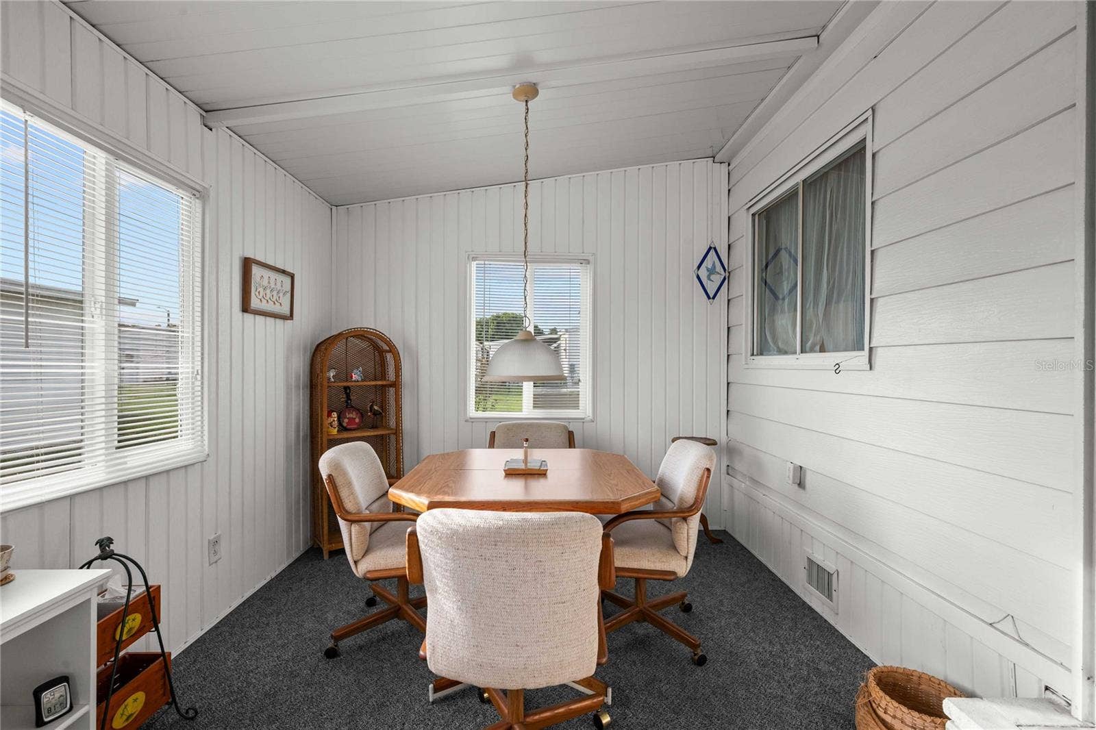 5352 PLANT STREET, Zephyrhills, FL 33542 Florida room is heated and cooled.