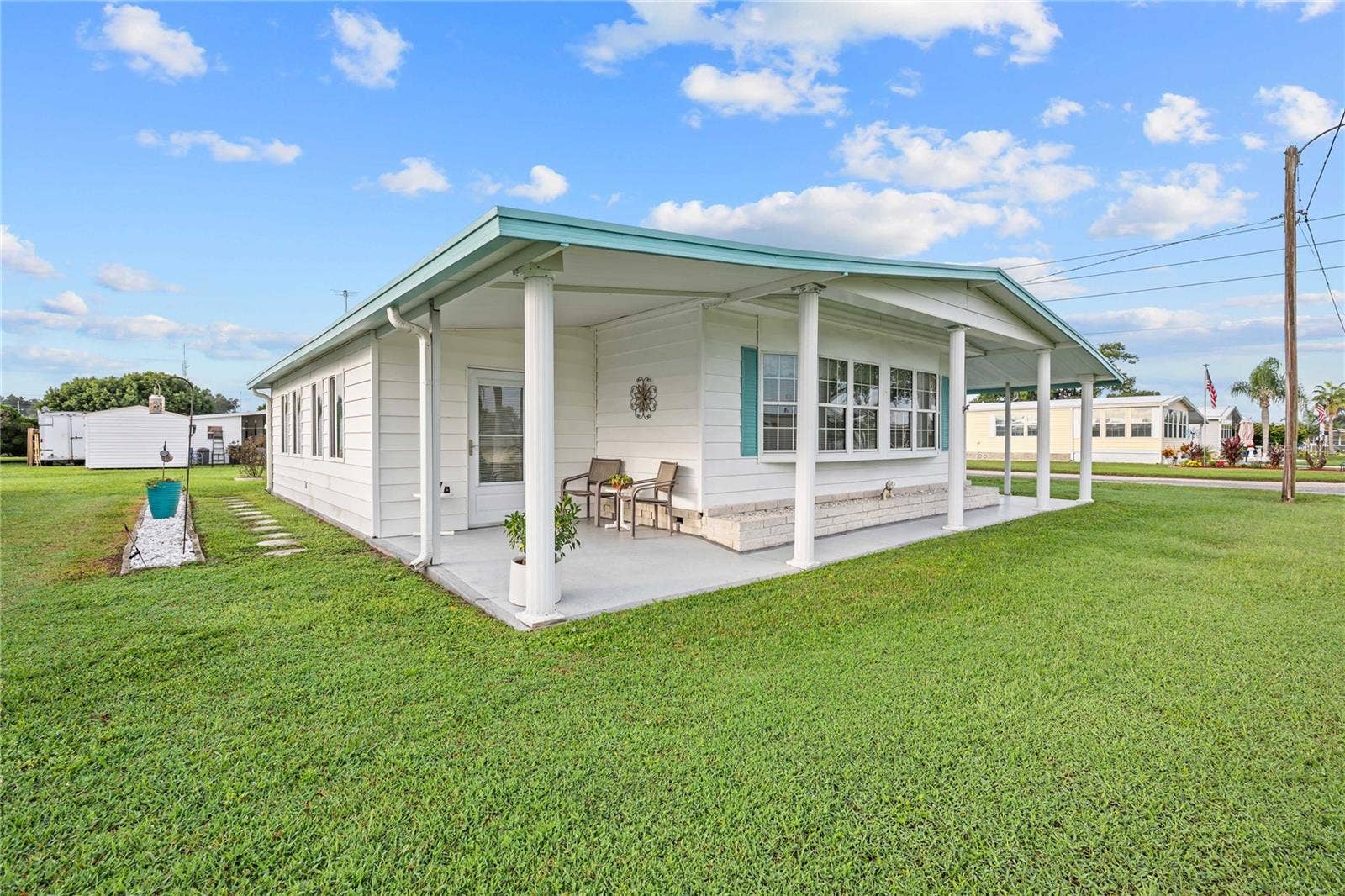 5352 PLANT STREET, Zephyrhills, FL 33542 Nice front covered porch.