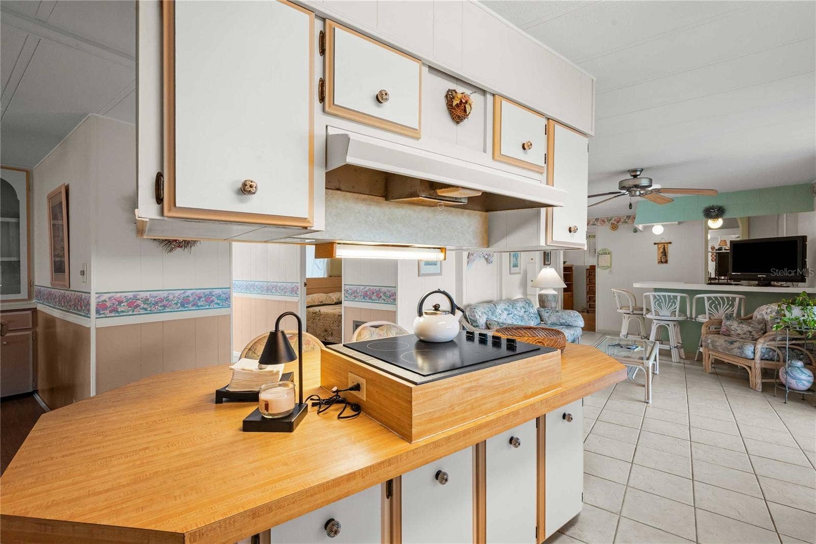 5352 PLANT STREET, Zephyrhills, FL 33542 Center island with plenty of storage.