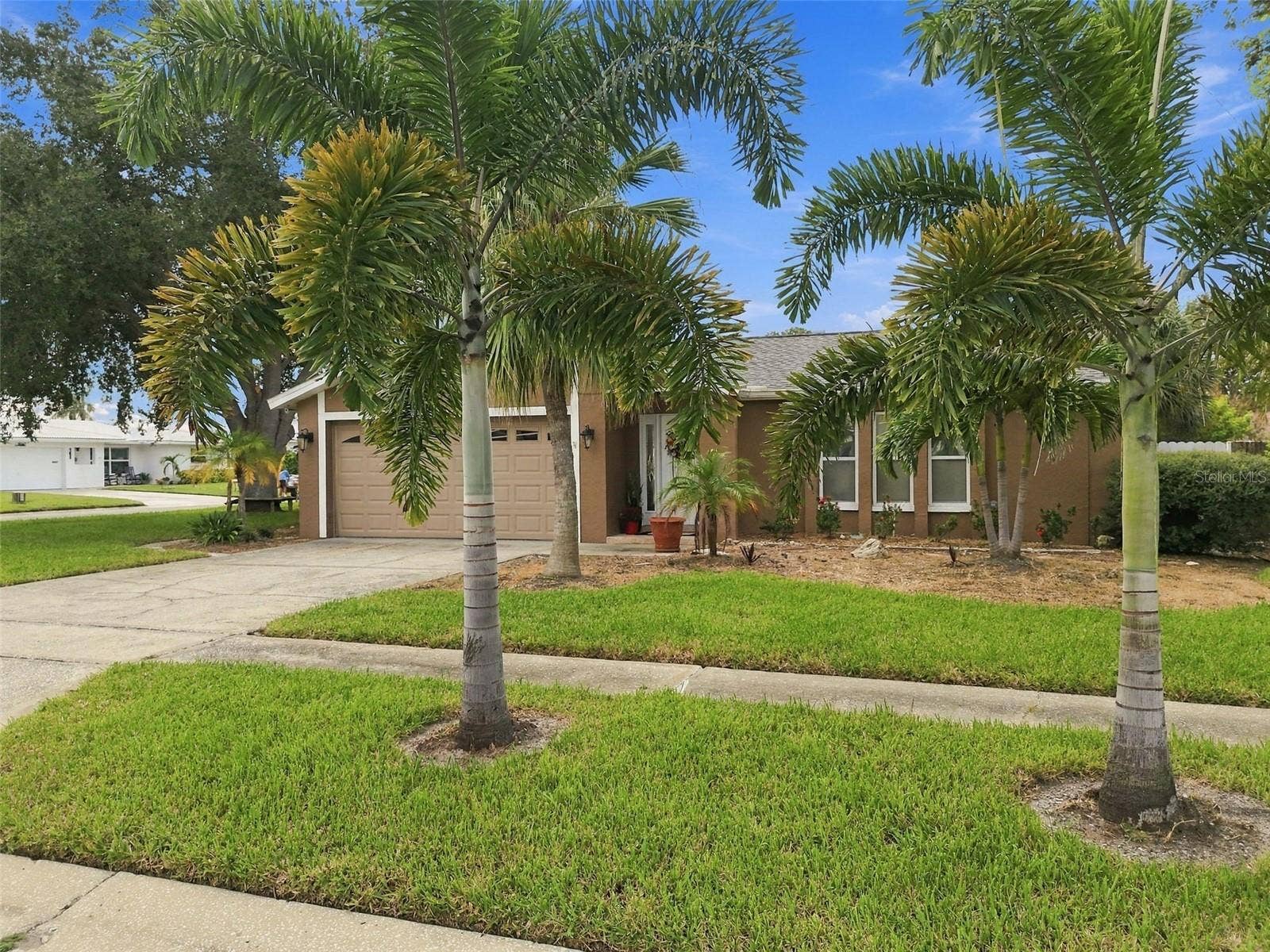 14304 91ST AVENUE, Seminole, FL 33776 MATURE LANDSCAPING/NEW SPRINKLER SYSTEM IN PLACE