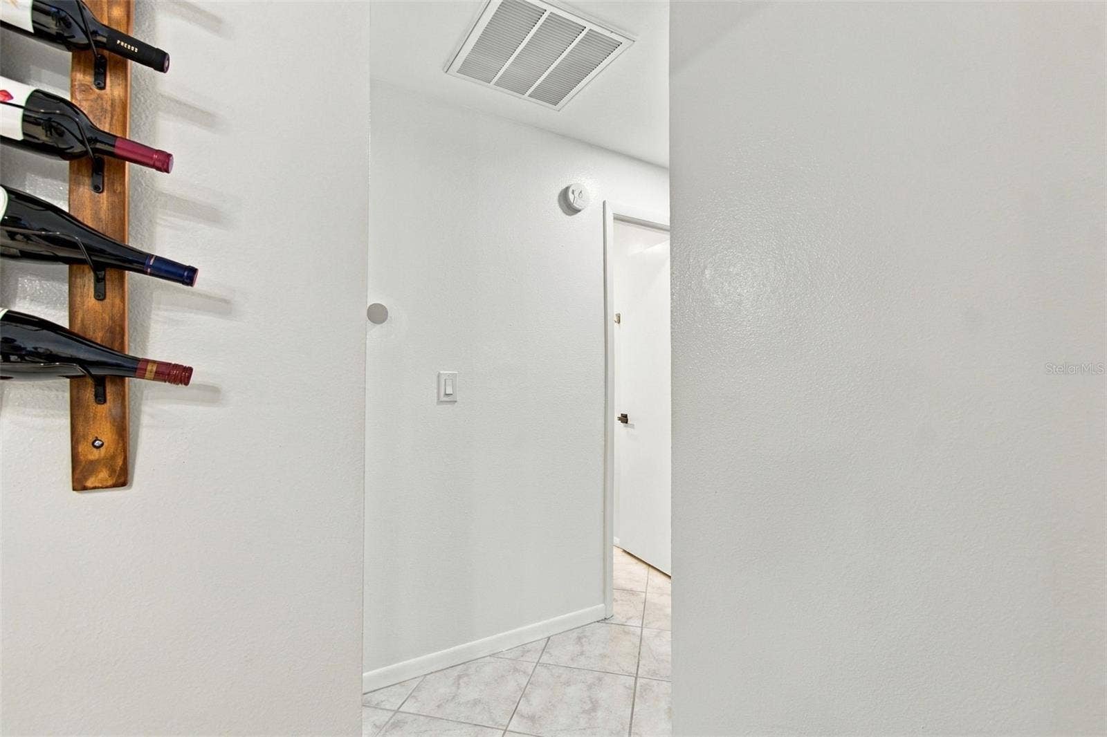 14304 91ST AVENUE, Seminole, FL 33776 HALLWAY TO BEDROOMS