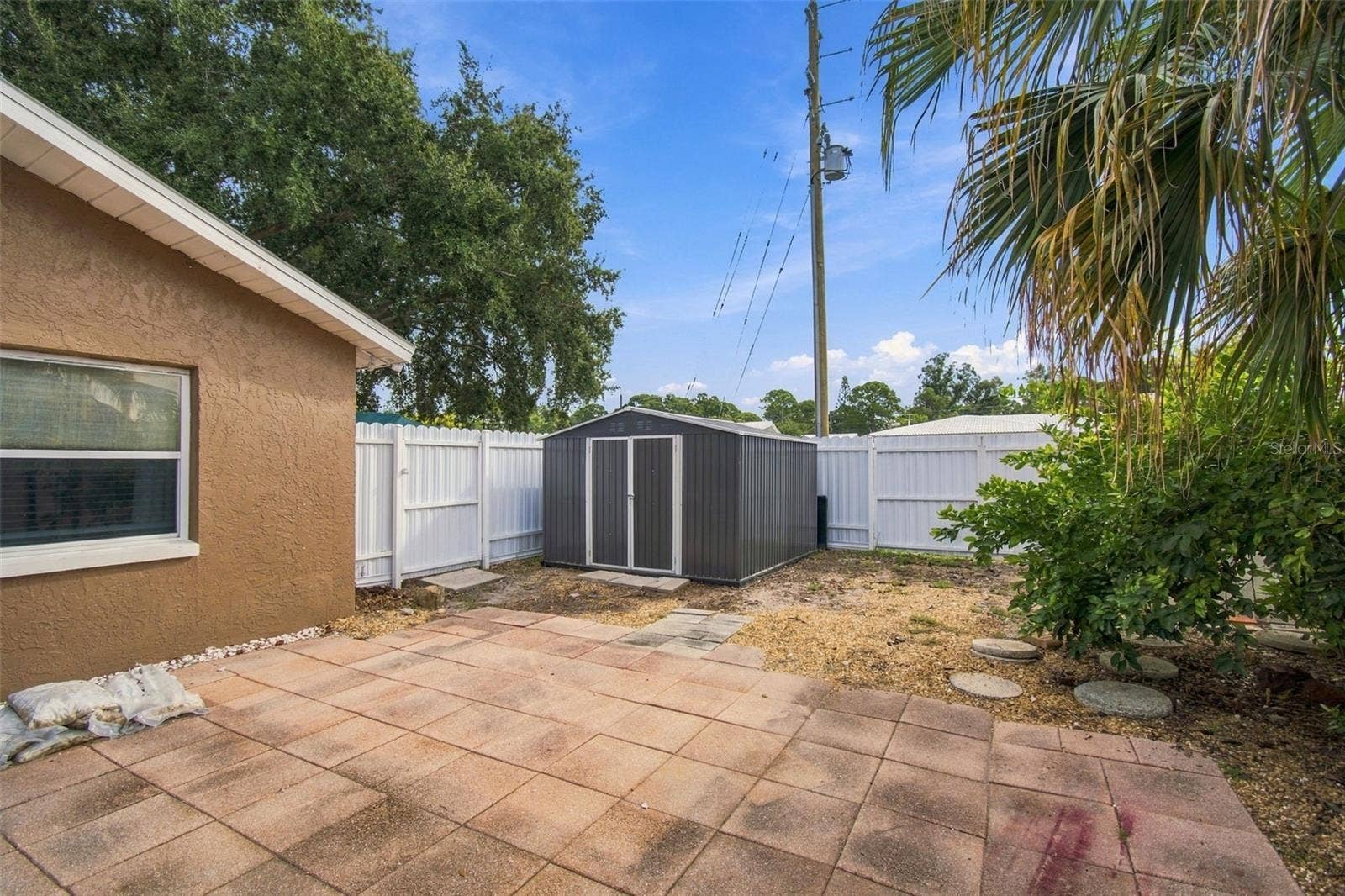 14304 91ST AVENUE, Seminole, FL 33776 GATE ENTRANCE ON BOTH SIDES OF PROPERTY FOR EASY ACCESS