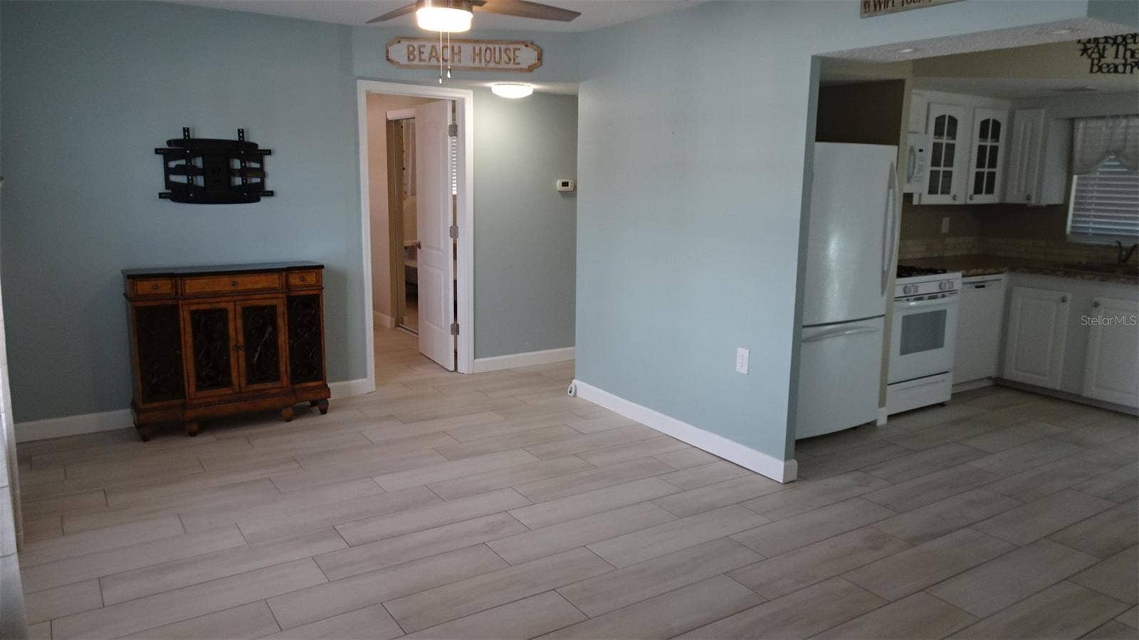 Living room, dining room to right.