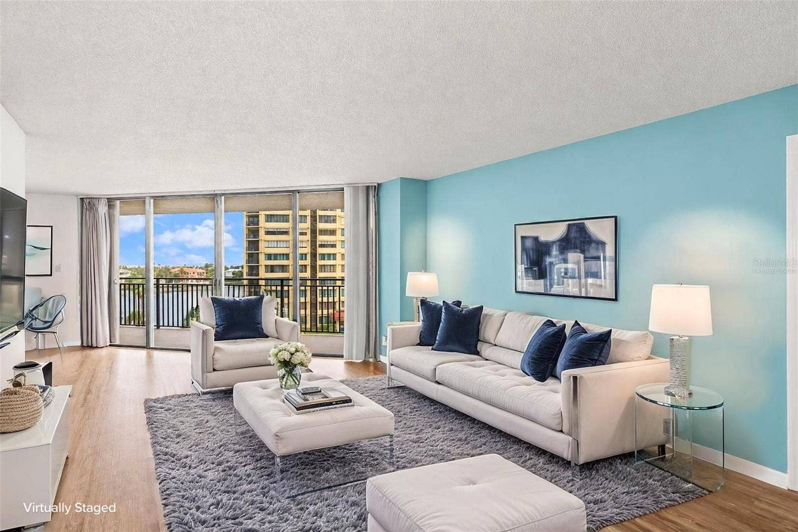 690 ISLAND WAY, #606, Clearwater, FL 33767 Living room, furniture virtual staging. Views are fabulous
