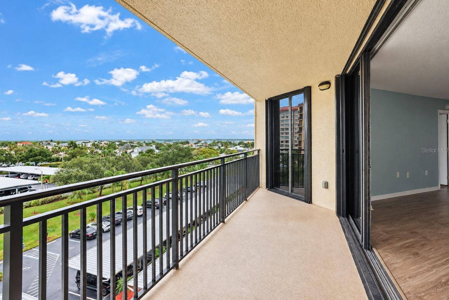 690 ISLAND WAY, #606, Clearwater, FL 33767 Large Patio undercover. New railings and non-skid flooring. Facing East