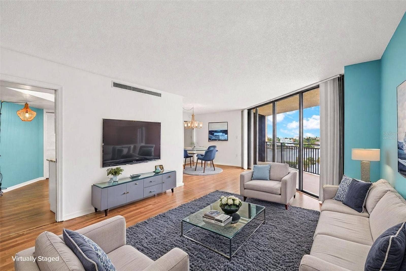 690 ISLAND WAY, #606, Clearwater, FL 33767 Living Room furniture virtually staged. Notice the stellar view.