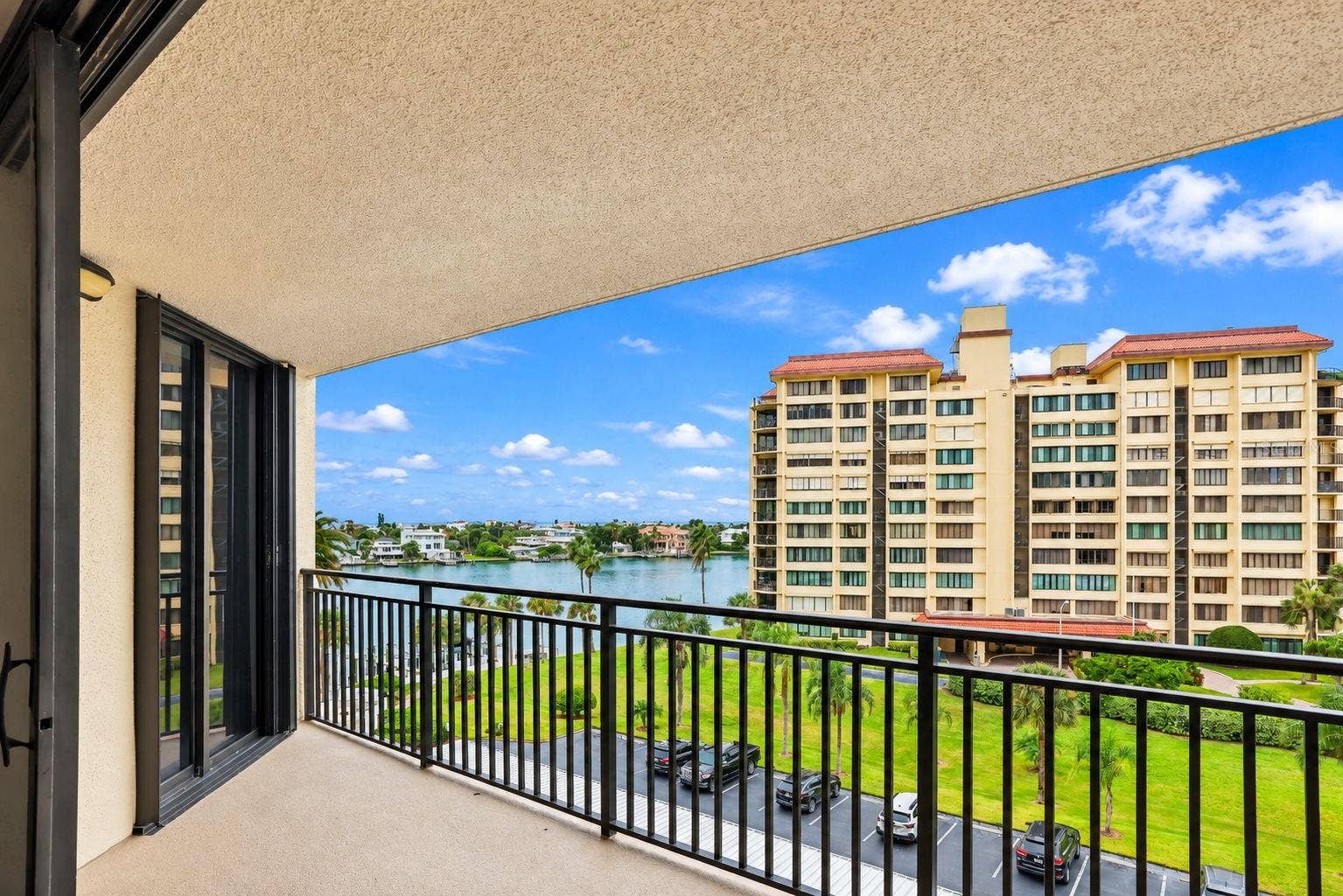690 ISLAND WAY, #606, Clearwater, FL 33767 Large Patio undercover. New railings and non-skid flooring. I've seen dolphins from here. Facing West.