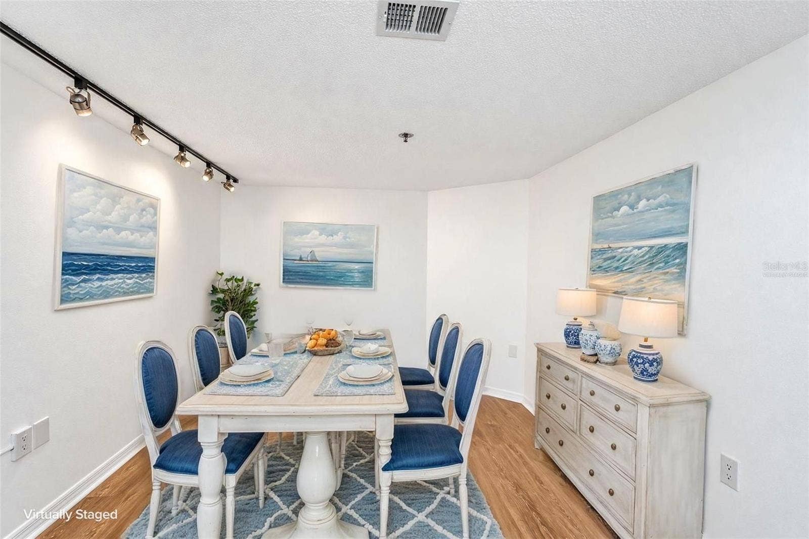 690 ISLAND WAY, #606, Clearwater, FL 33767 Option 2 for den = dining room furniture virtually staged