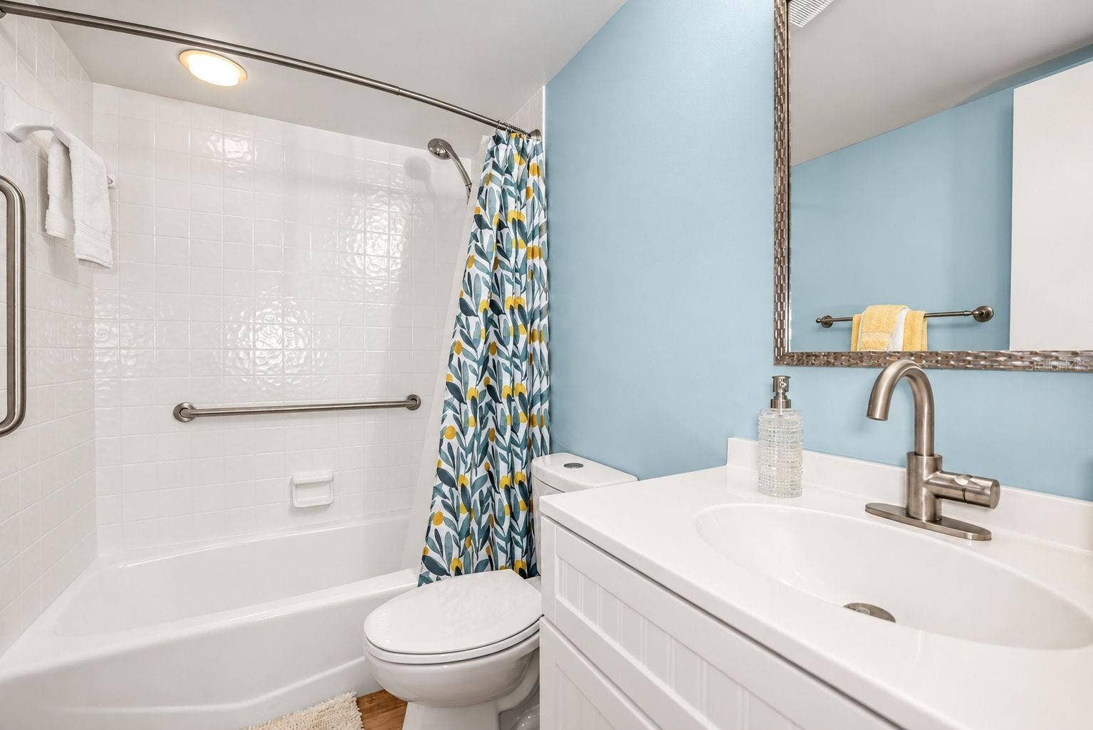 690 ISLAND WAY, #606, Clearwater, FL 33767 Guest bathroom with updates - Vanity, lighting, mirror, toilet and flooring