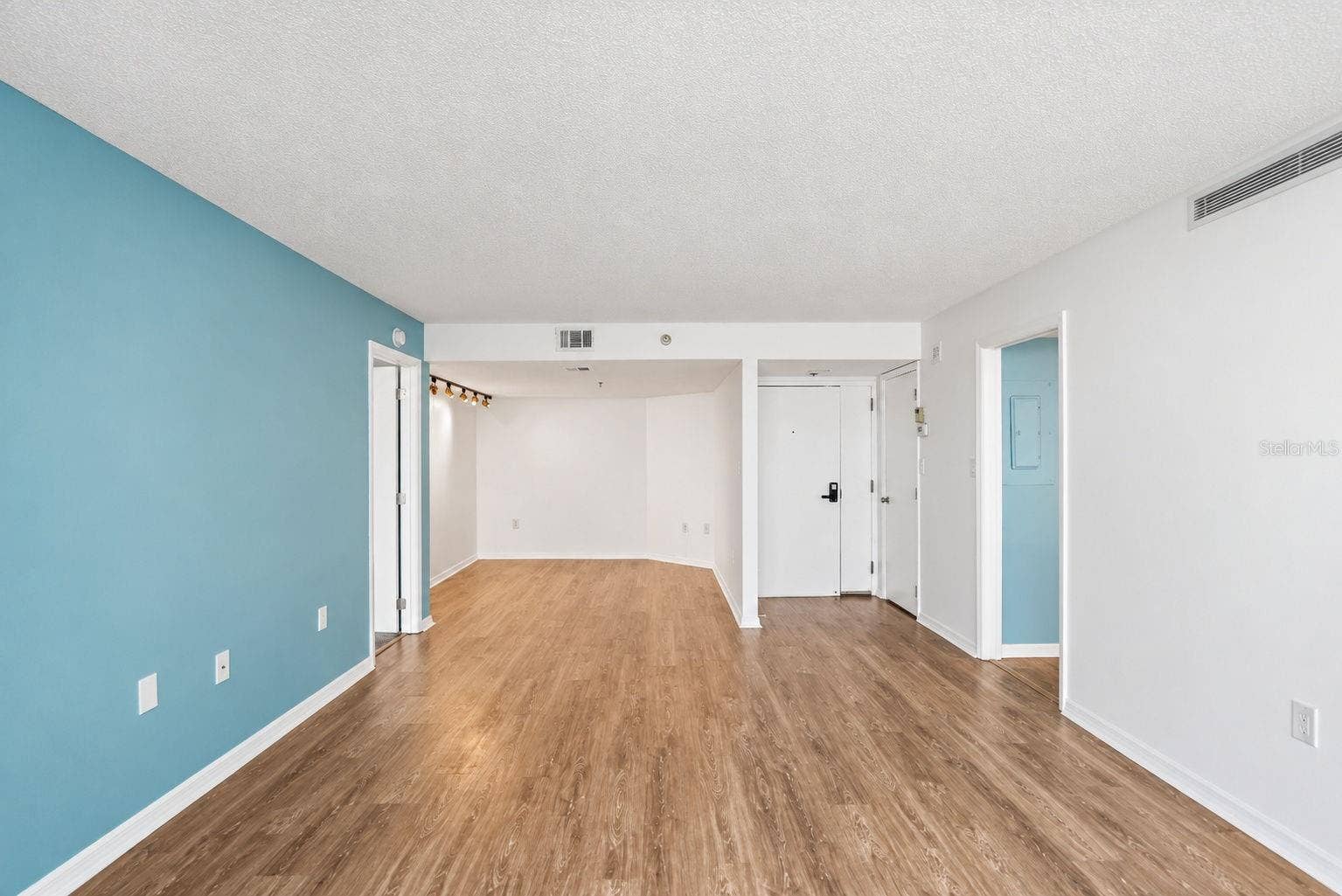 690 ISLAND WAY, #606, Clearwater, FL 33767 living room with view of den