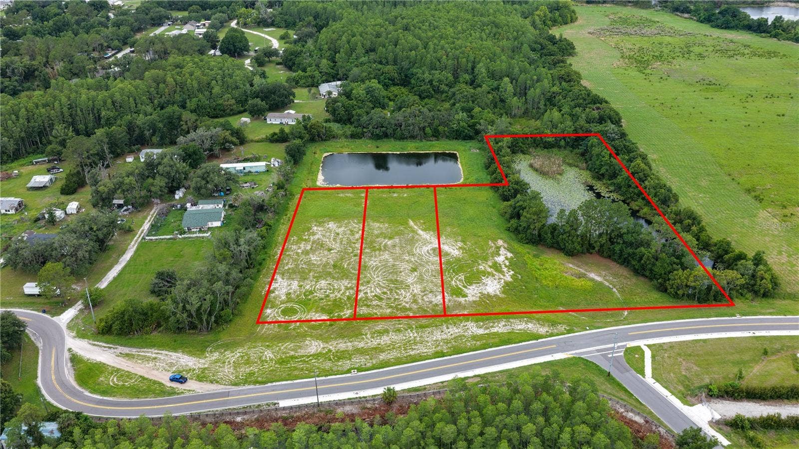 CAUSEWAY BOULEVARD, Land O Lakes, FL 34638 Lots 1, 2, 3 (Left to Right)