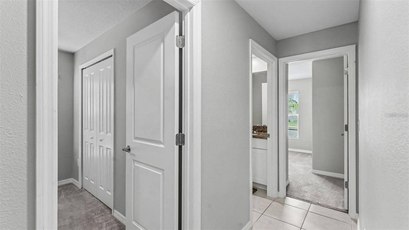 HALLWAY TO THREE BEDROOMS - SPLIT PLAN
