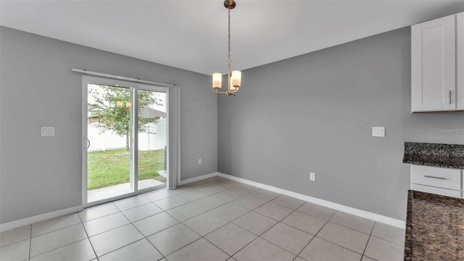 SLIDING DOOR TO BACKYARD
