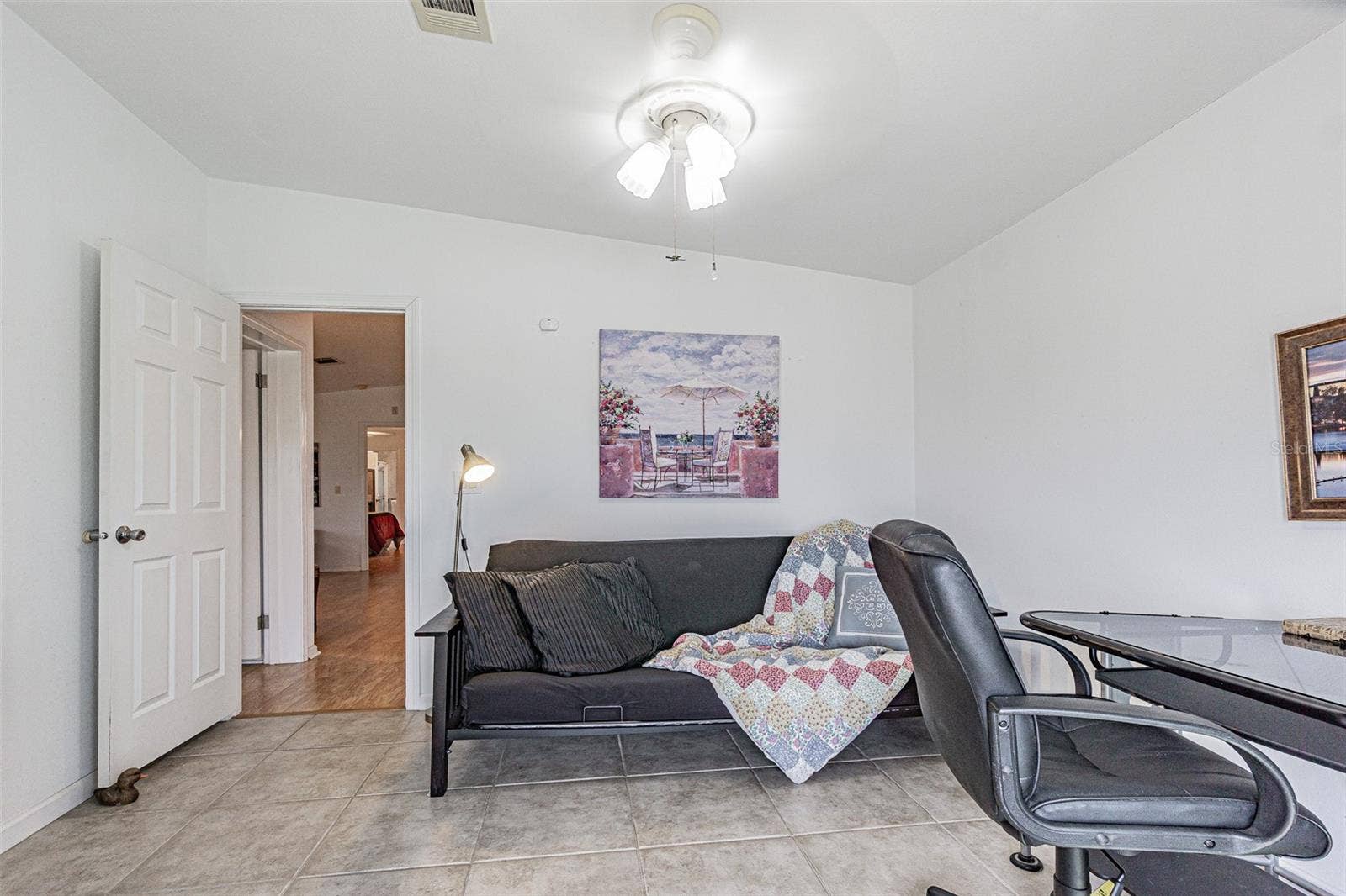 Futon in office doubles as 3rd or guest bedroom