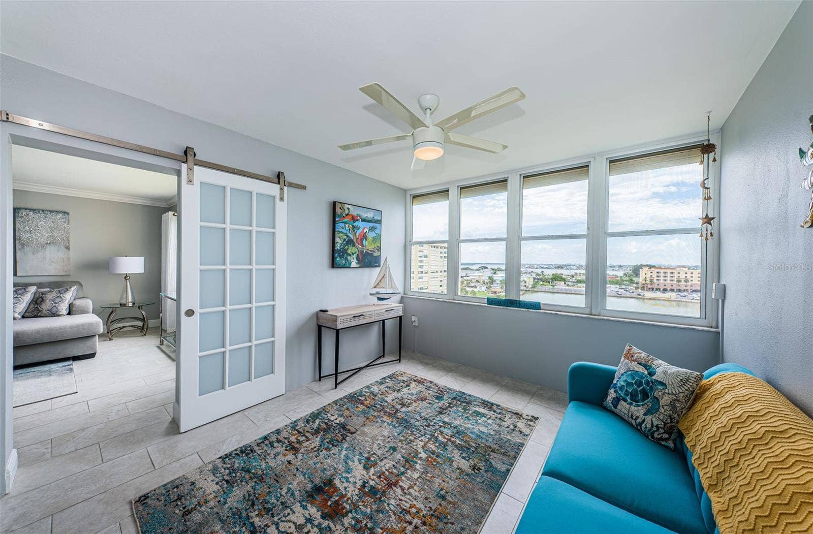 4775 COVE CIRCLE, #904, St Petersburg, FL 33708 Lanai just off the living area and primary bedroom