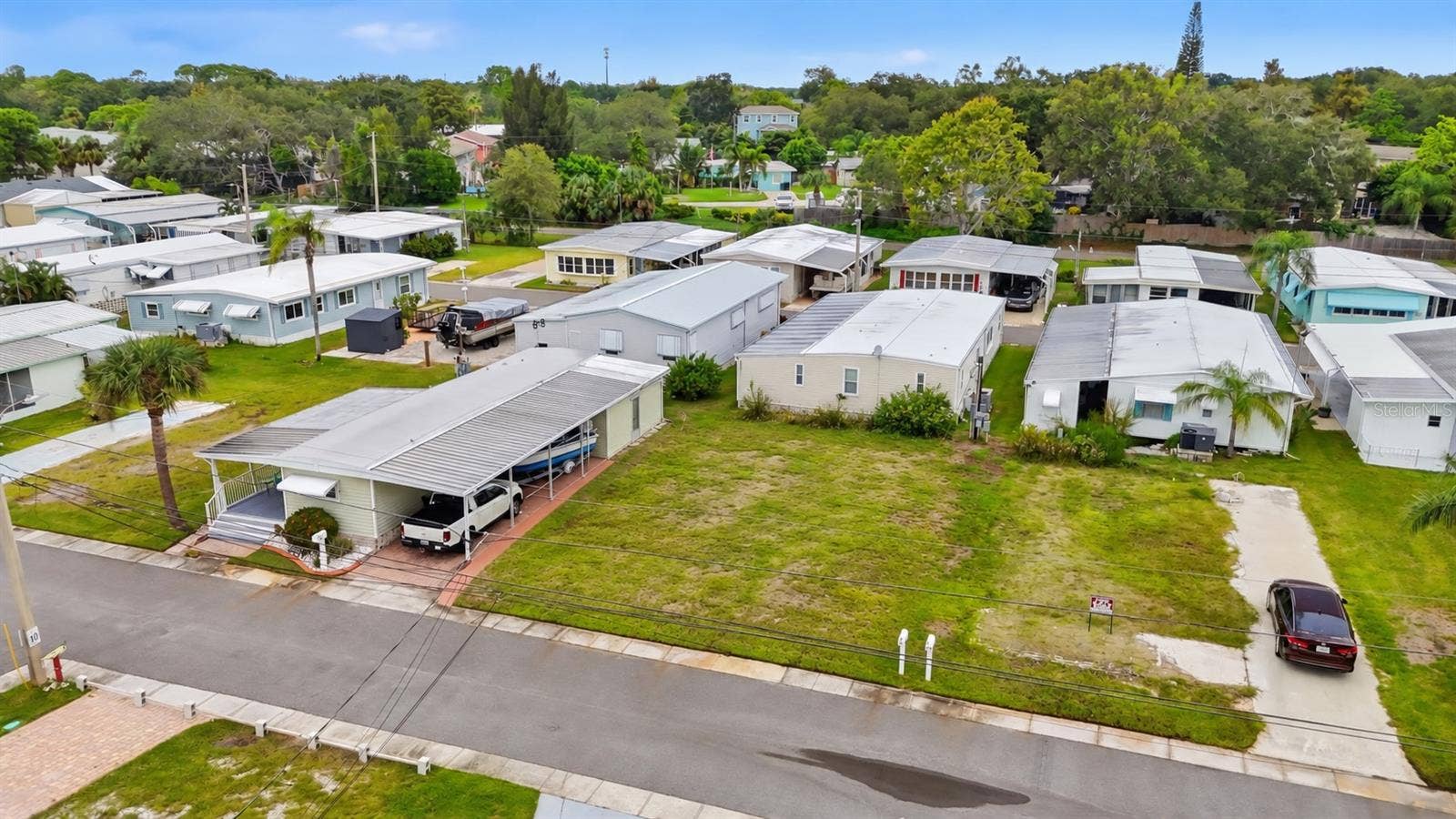 65 SCHOONER DRIVE, #65, Palm Harbor, FL 34683 Arial view with mobile home removed to show vacant lot