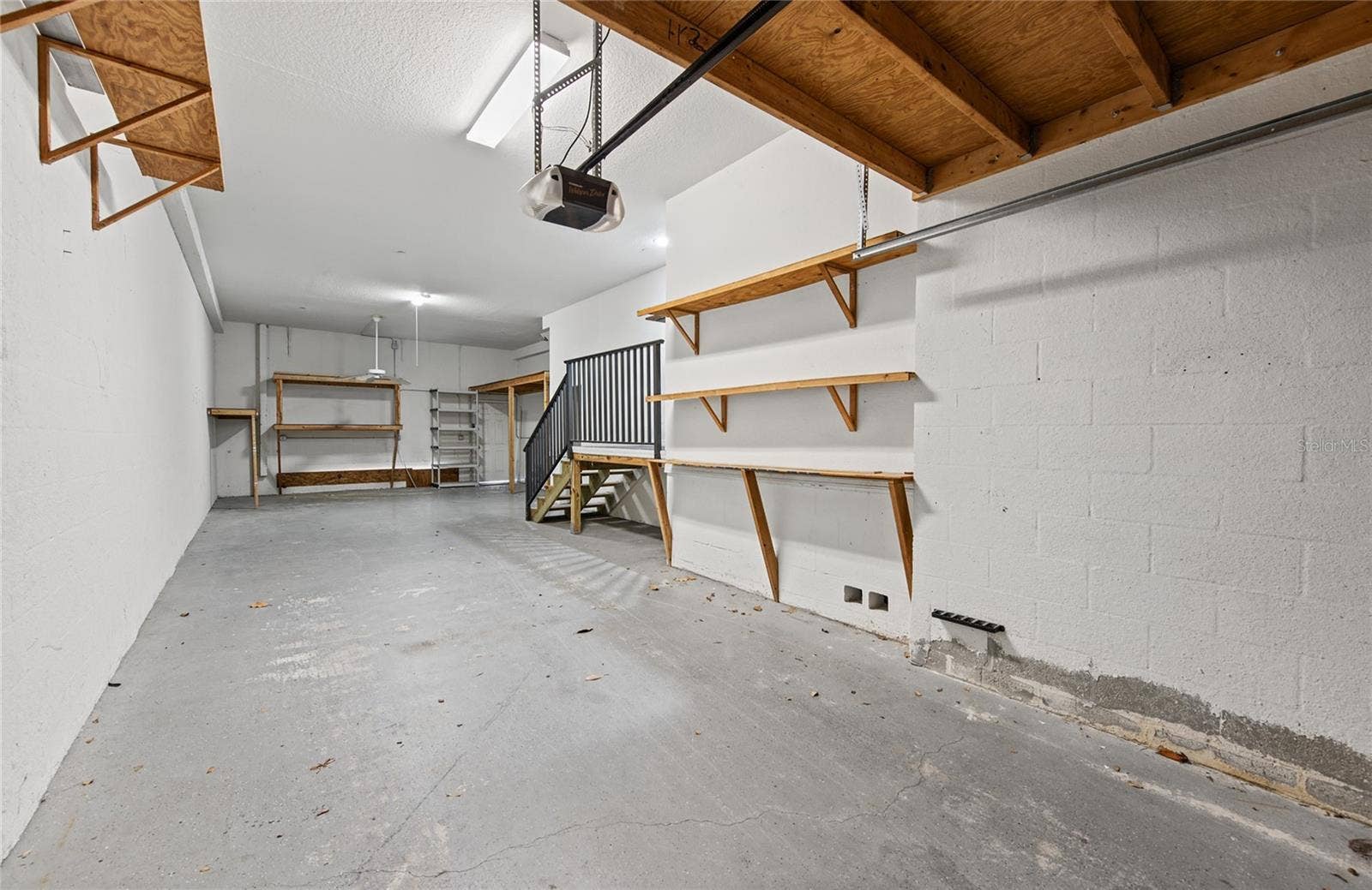 1146 VENETIAN HARBOR DRIVE NE, St Petersburg, FL 33702 lots of built in storage in 3 car garage