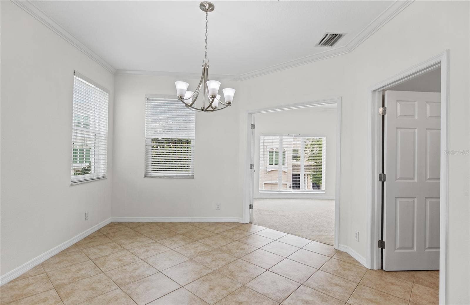 1146 VENETIAN HARBOR DRIVE NE, St Petersburg, FL 33702 fresh paint in dining area