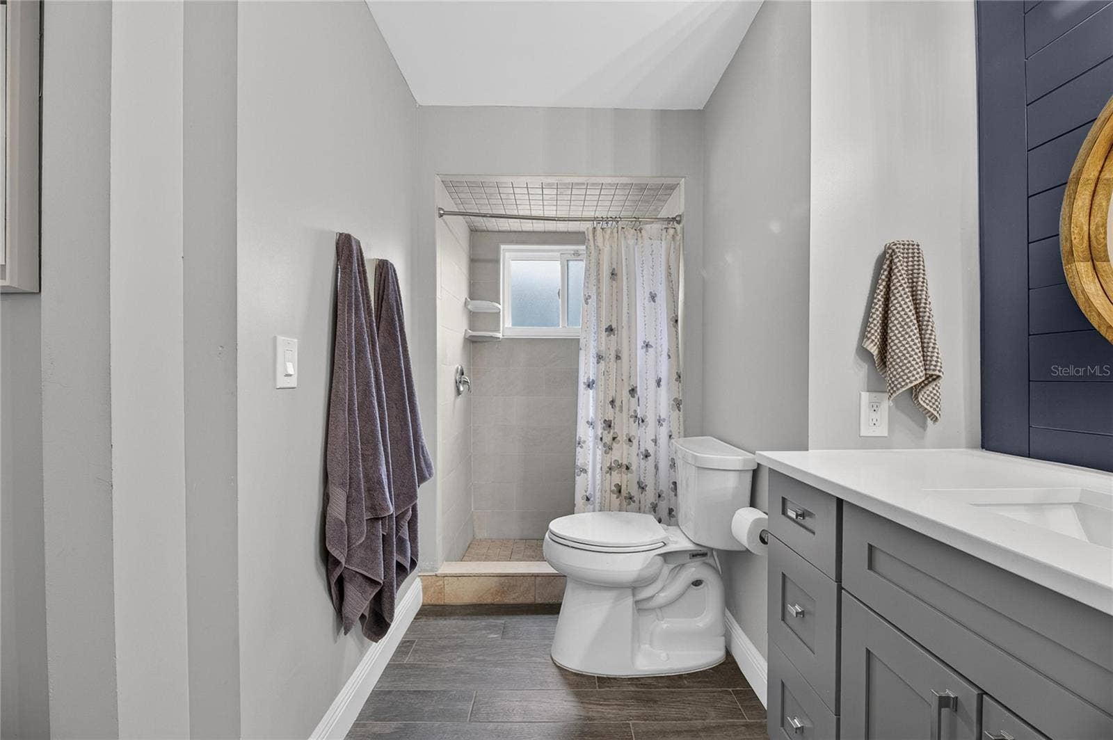 Also Features A Kohler Extended Height Commode, As Well As A Completely Tiled Top-To-Bottom Walk-In Shower!