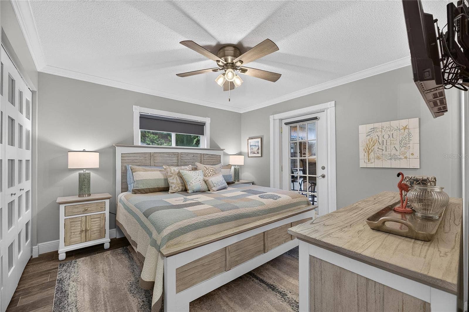 The Considerably Sized 15'x13" Rear Bedroom Is Highlighted With A Personal French Door Opening Directly To The Oasis!