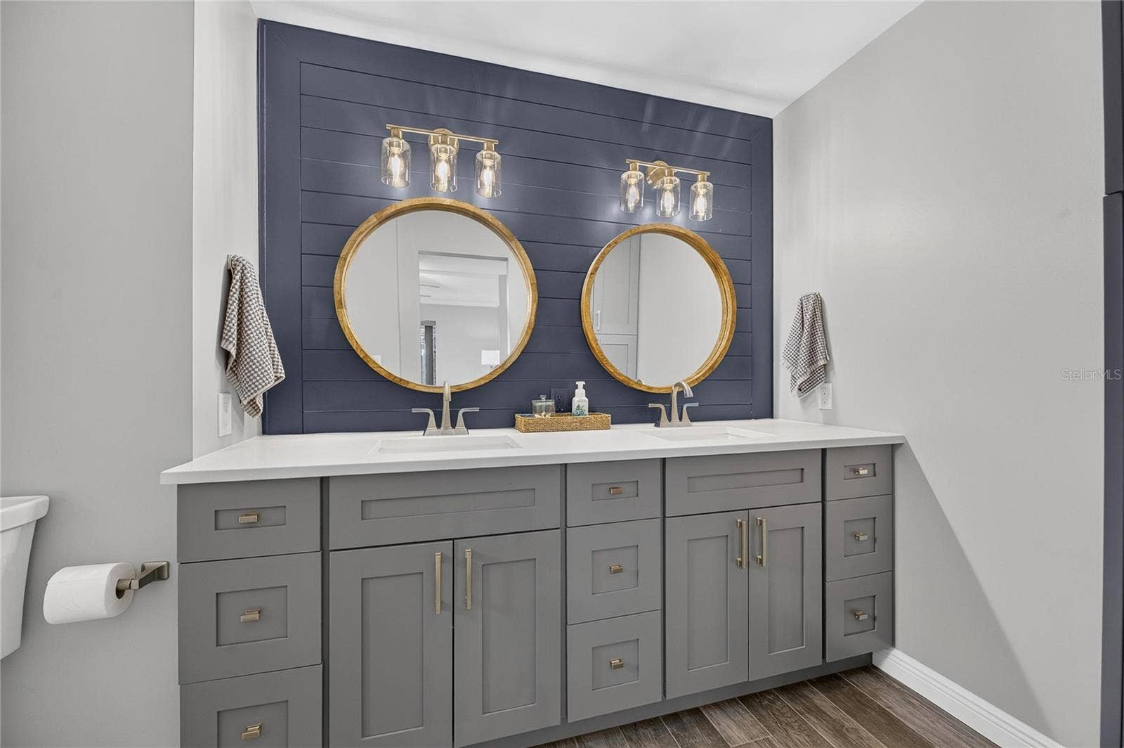 Step Into The Owner's Ensuite Bath!! Extended Height Vanity, Dual Sinks, And Decorative Shiplap & Mirrors!