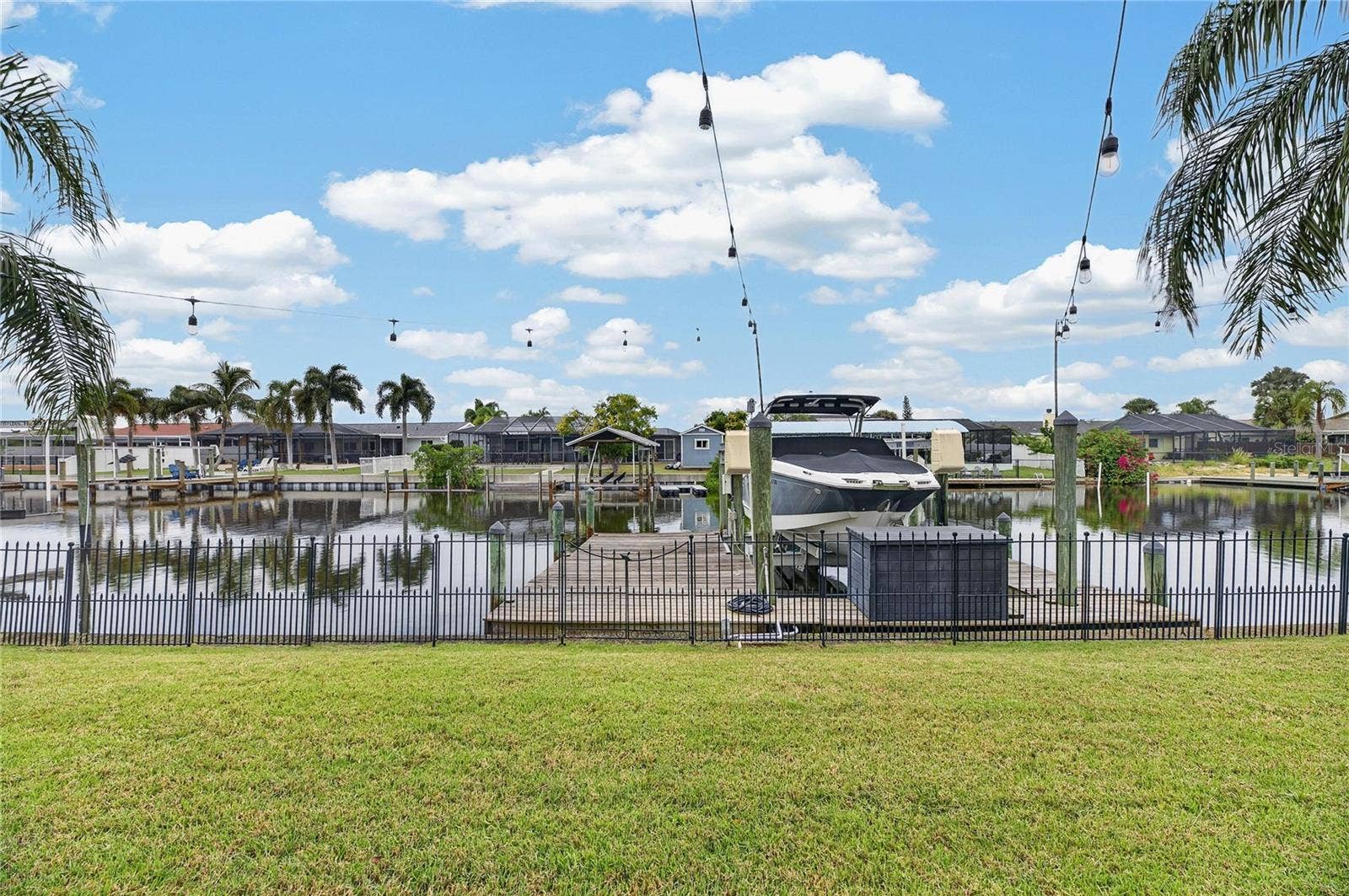 Wood Dock, Wrapped Pilings & A 10,000lb Lift! AND The Deck Box Stays!