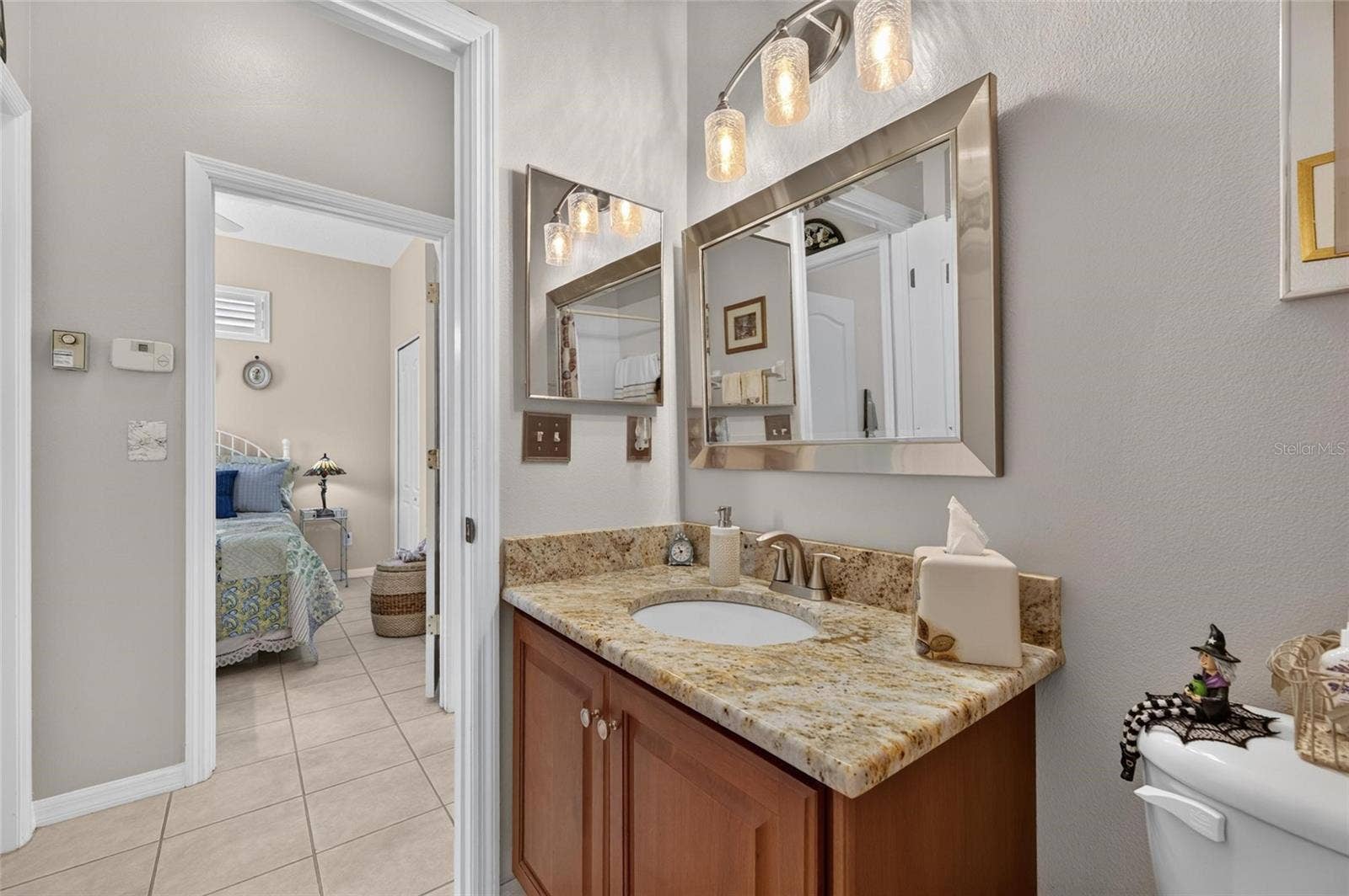 1229 HUNTINGTON GREENS DRIVE, #12, Sun City Center, FL 33573 Guest Bathroom