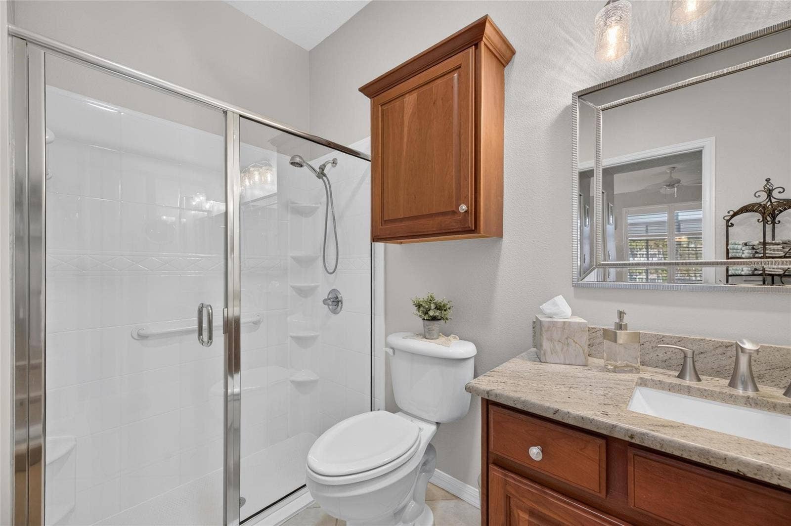 1229 HUNTINGTON GREENS DRIVE, #12, Sun City Center, FL 33573 Primary Bathroom with Step-in Shower