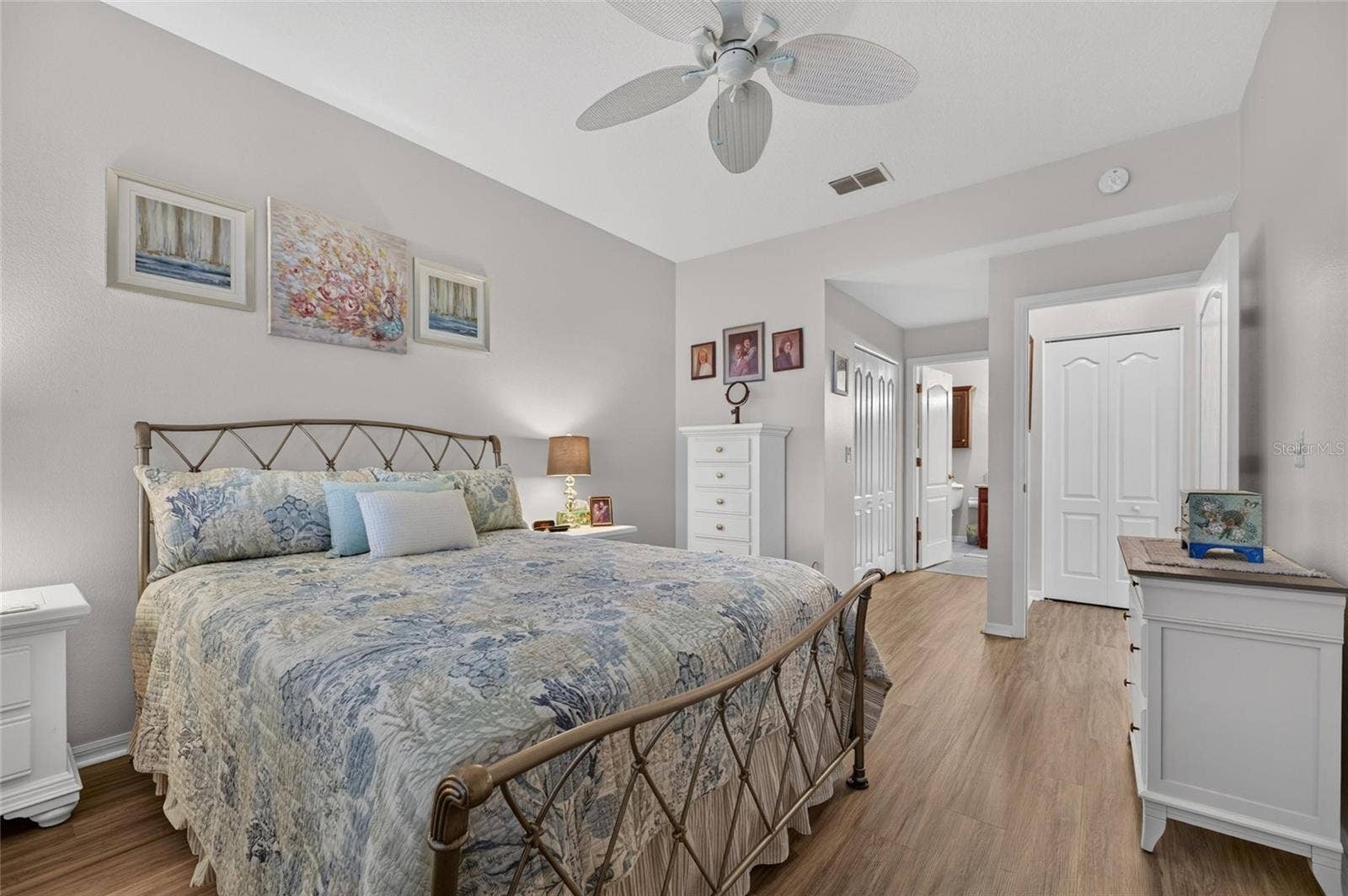 1229 HUNTINGTON GREENS DRIVE, #12, Sun City Center, FL 33573 Primary bedroom with en suite bathroom