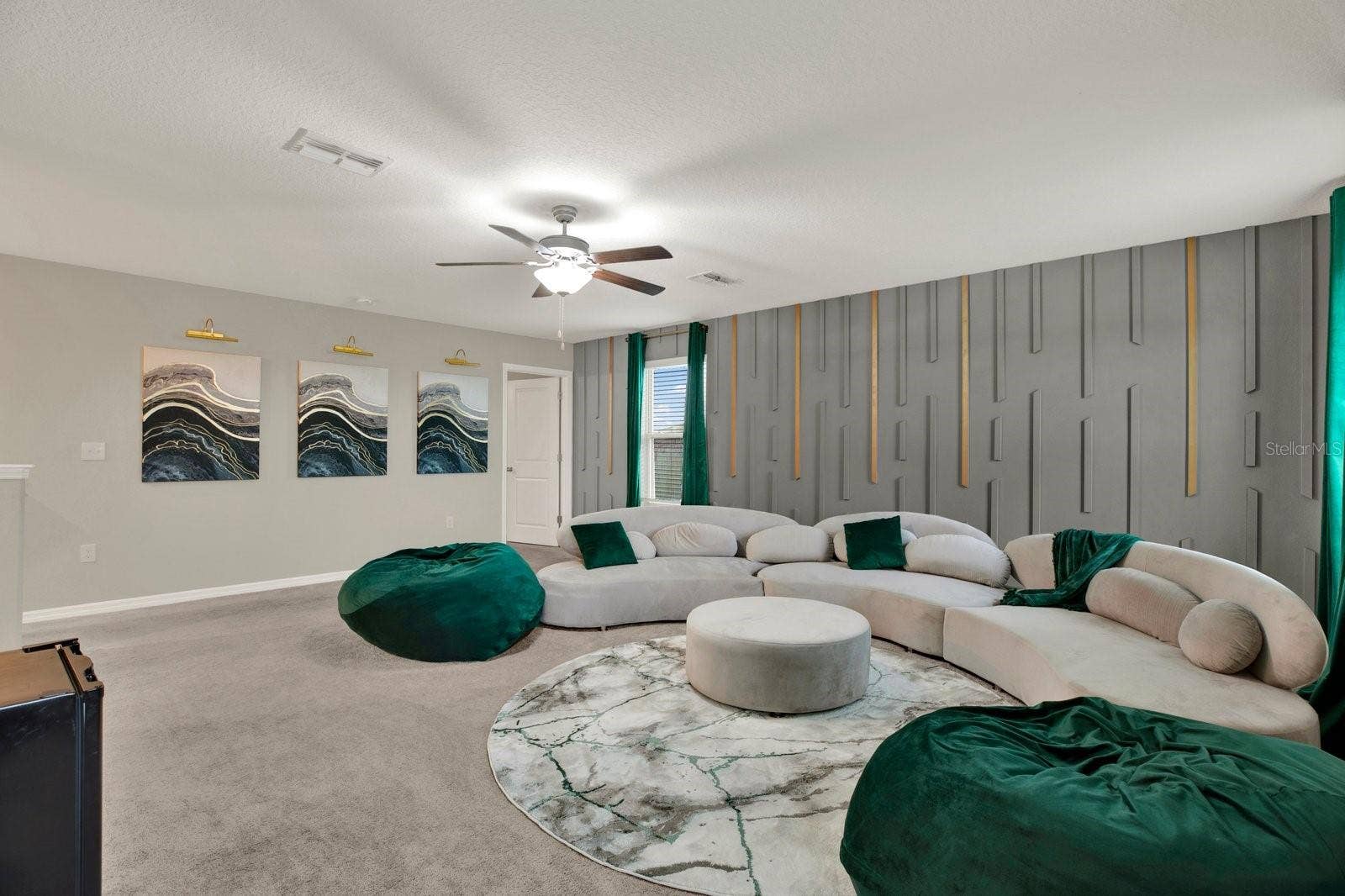 The primary bedroom is off the bonus room.