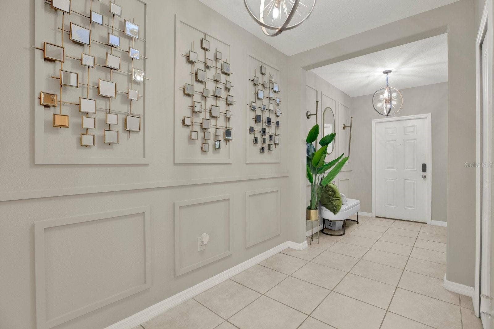 Wide Foyer with decorative molding
