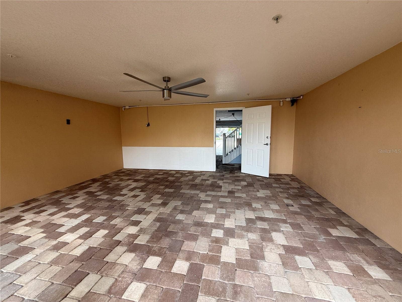 Covered Patio Facing the Water in the Rear of the Townhome