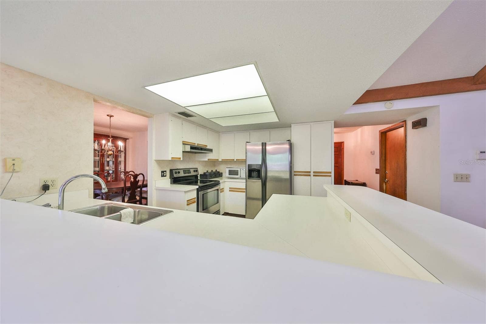 2609 MANOR OAK DRIVE, Valrico, FL 33596 Kitchen pantry is to the right of the fridge