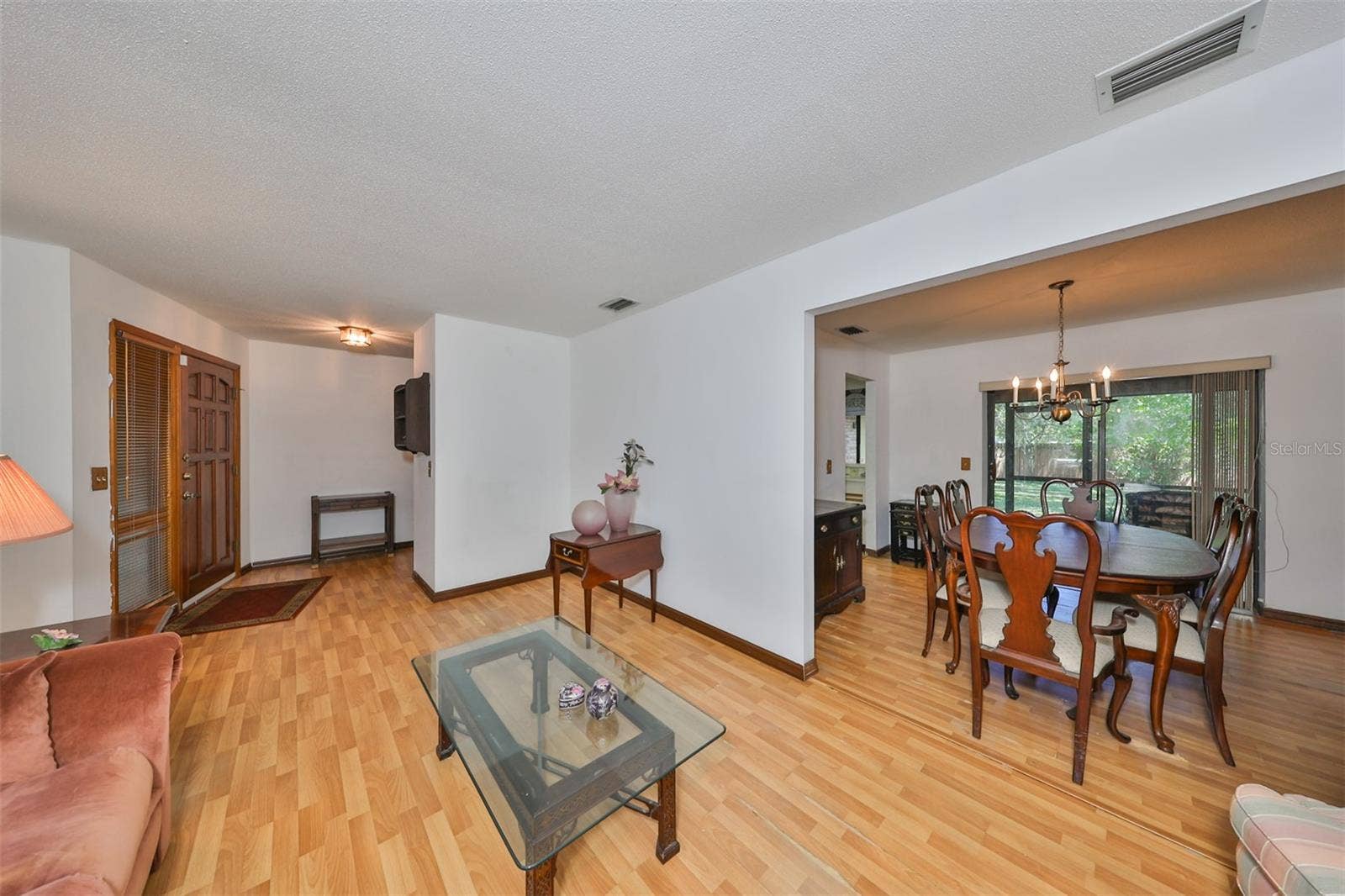 2609 MANOR OAK DRIVE, Valrico, FL 33596 Living Room connects to the Dining room.