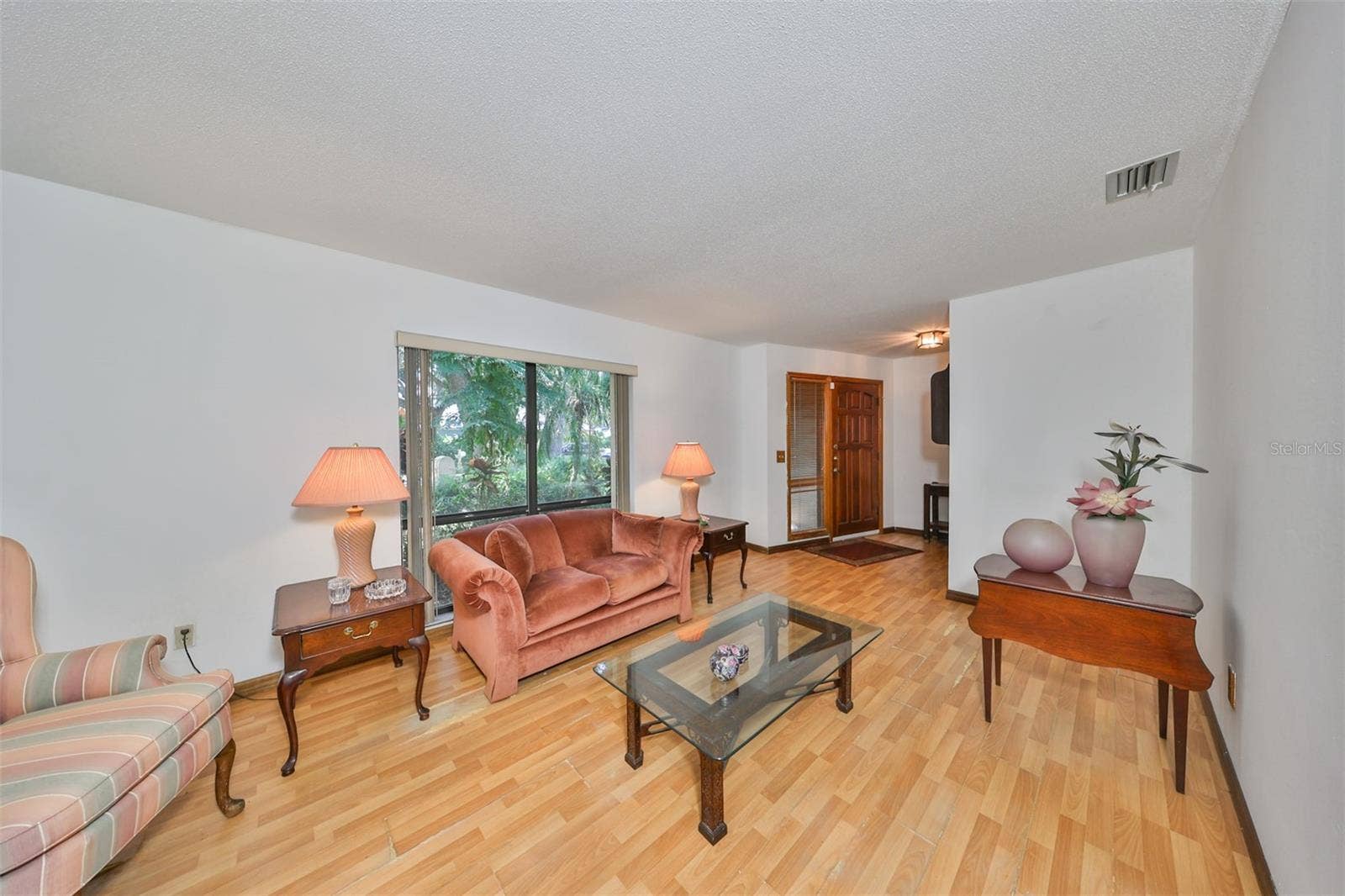 2609 MANOR OAK DRIVE, Valrico, FL 33596 Living Room is large and separate so that you can enjoy solitude or engage in different activities
