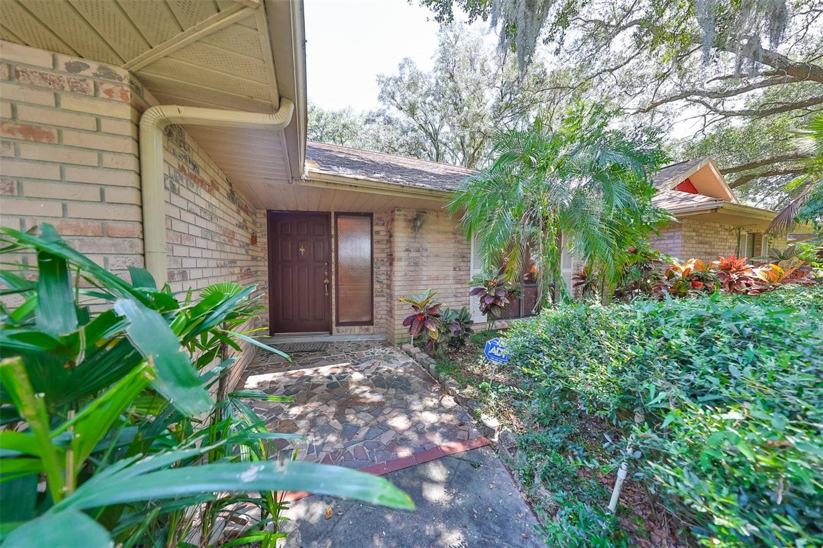 2609 MANOR OAK DRIVE, Valrico, FL 33596 Front entrance is covered to keep you and guests out of the elements.