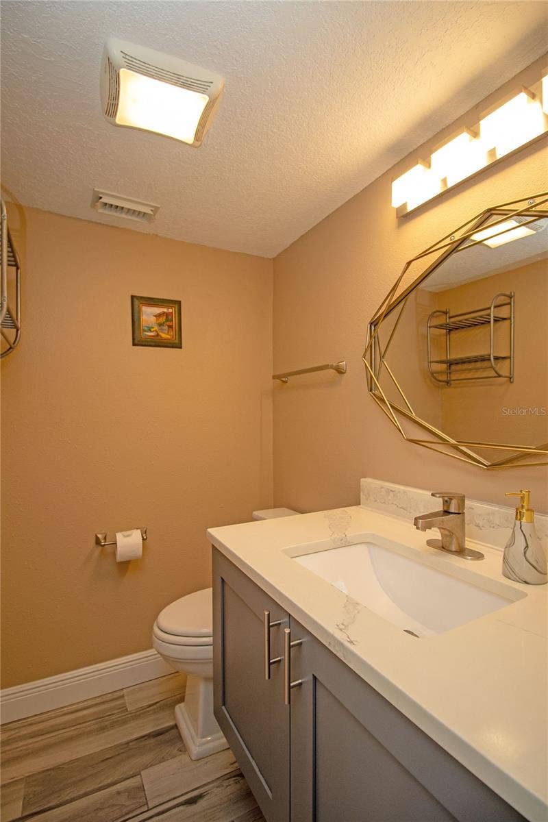 1640 CAPE HOPE AVENUE NE, #2, St Petersburg, FL 33702 Powder room downstairs