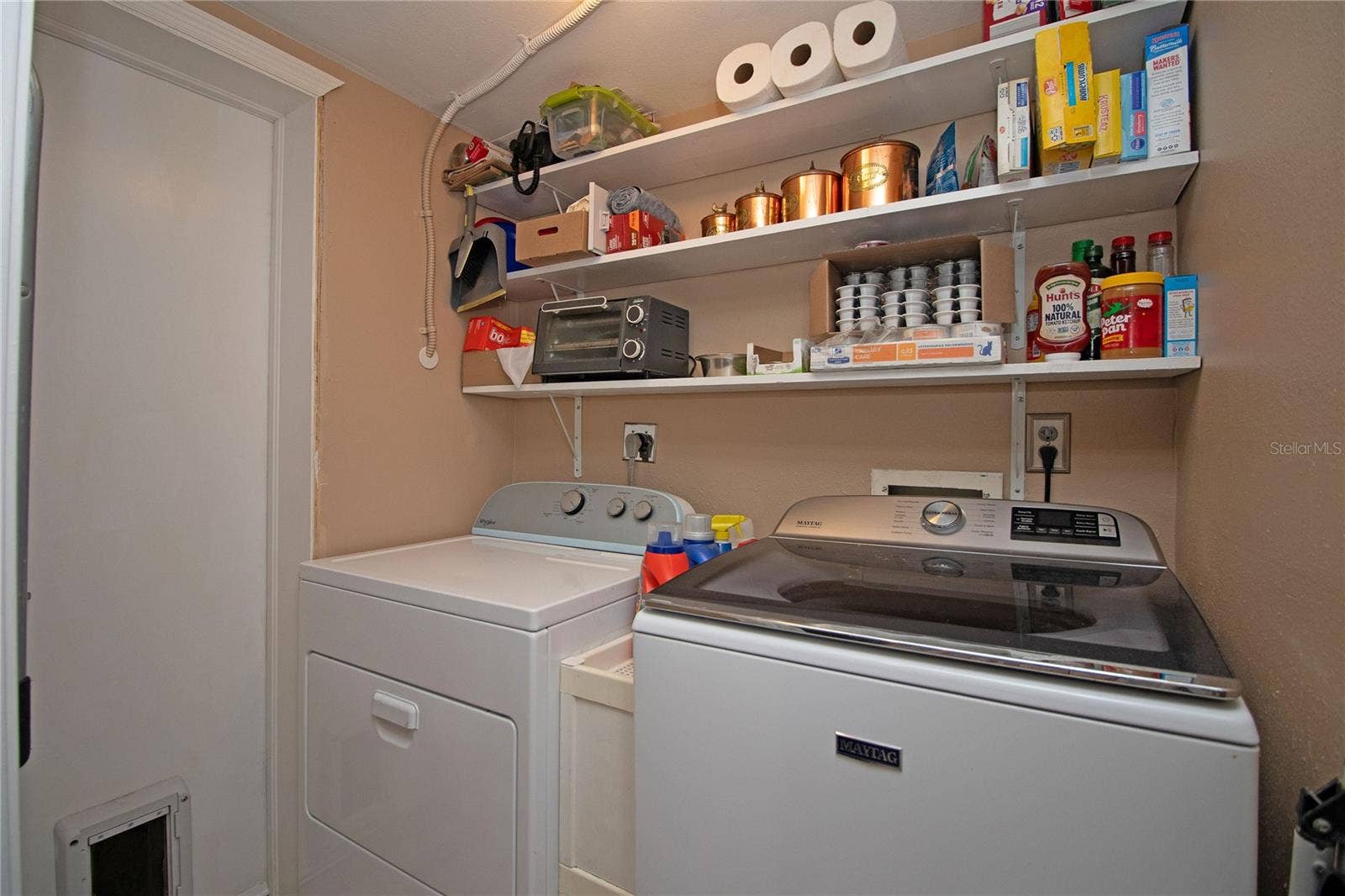 1640 CAPE HOPE AVENUE NE, #2, St Petersburg, FL 33702 Laundry room.