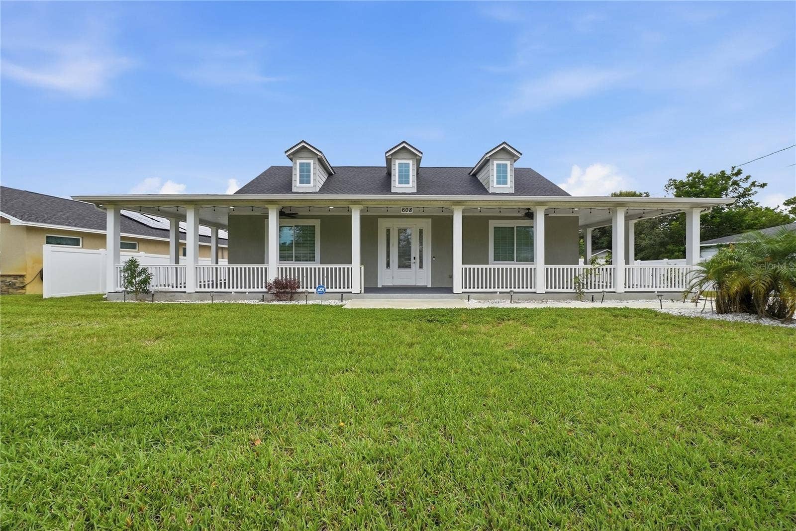 608 4TH STREET SW, Largo, FL 33770 Front Exterior View with beautiful wrap around porch