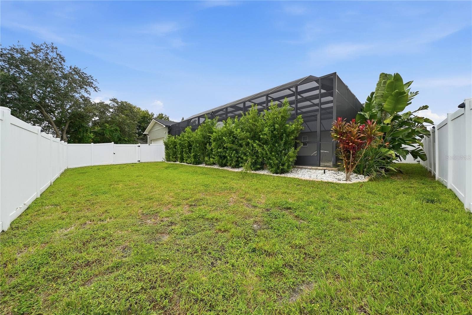 608 4TH STREET SW, Largo, FL 33770 Back of pool area - nice size backyard