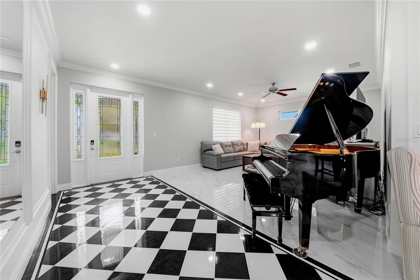 608 4TH STREET SW, Largo, FL 33770 Living area / grand piano