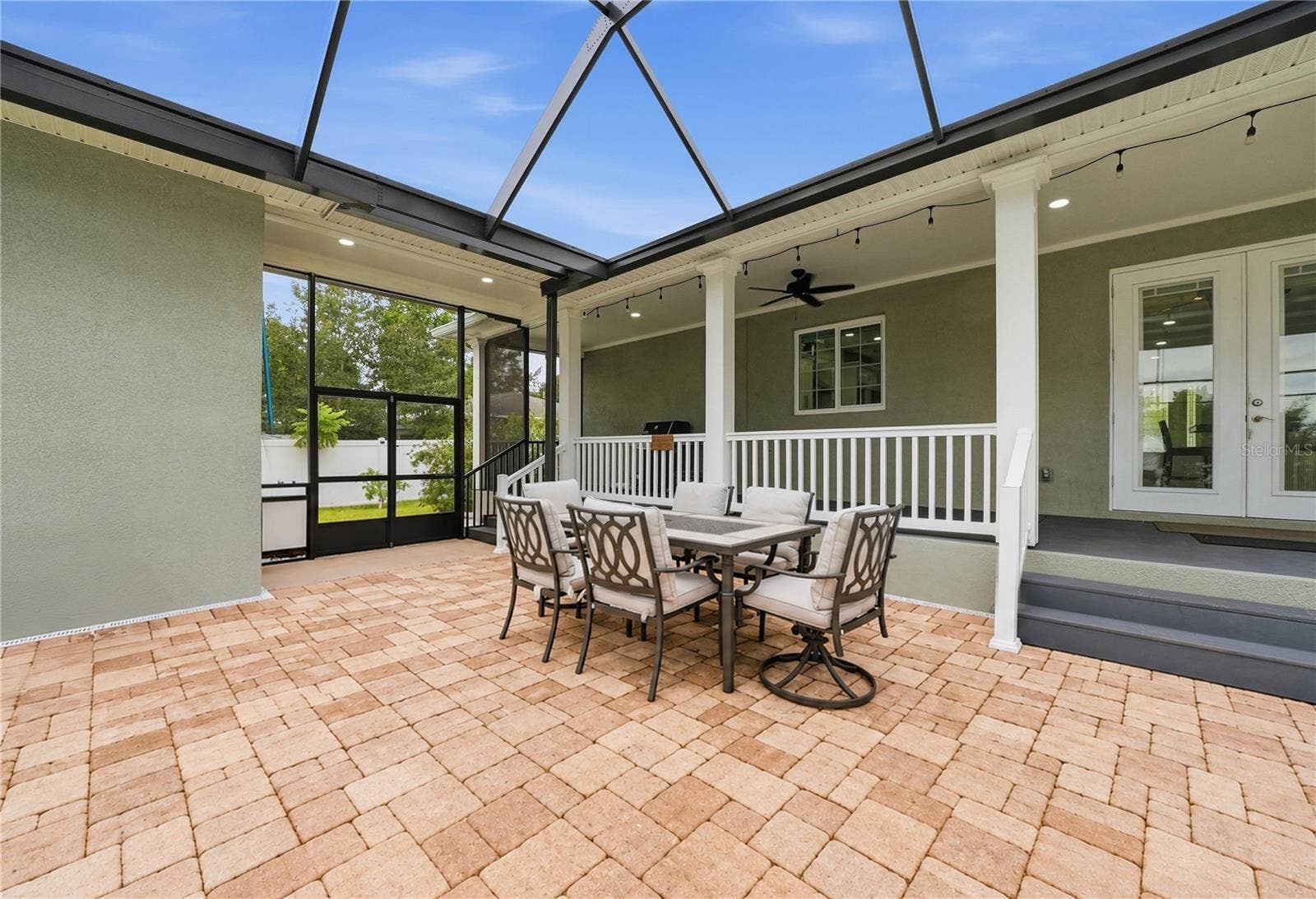 608 4TH STREET SW, Largo, FL 33770 Covered porch overlooking screened lanai
