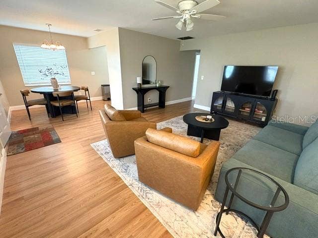 2202 CLUBHOUSE DRIVE, #173, Sun City Center, FL 33573 Living room toward dining.
