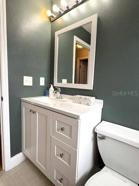 2202 CLUBHOUSE DRIVE, #173, Sun City Center, FL 33573 Guest bath vanity has plenty of storage room.