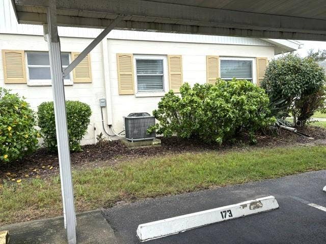 2202 CLUBHOUSE DRIVE, #173, Sun City Center, FL 33573 Covered parking is convenient to both front and back doors of home.