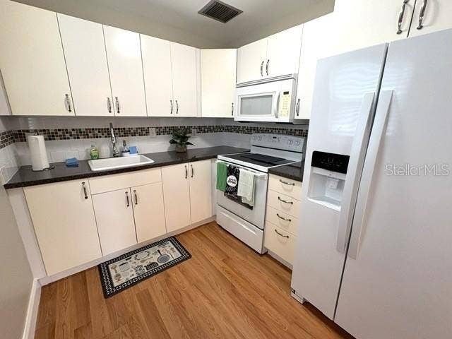 2202 CLUBHOUSE DRIVE, #173, Sun City Center, FL 33573 Nice kitchen, clean and bright. Updated appliances.