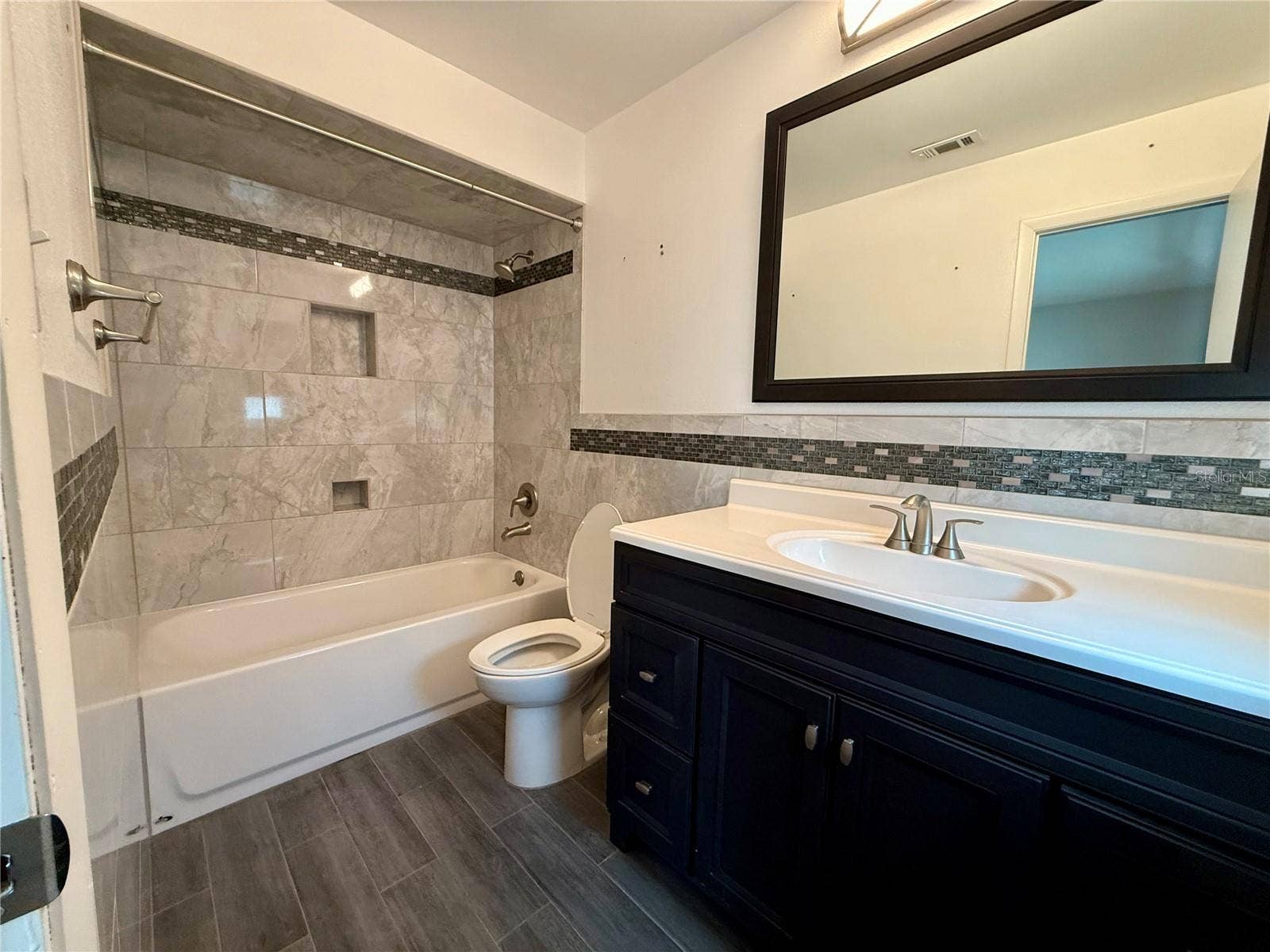 7523 BLOSSOM AVENUE, Tampa, FL 33614 7523 BLOSSOM AVENUE, Tampa, FL 33614