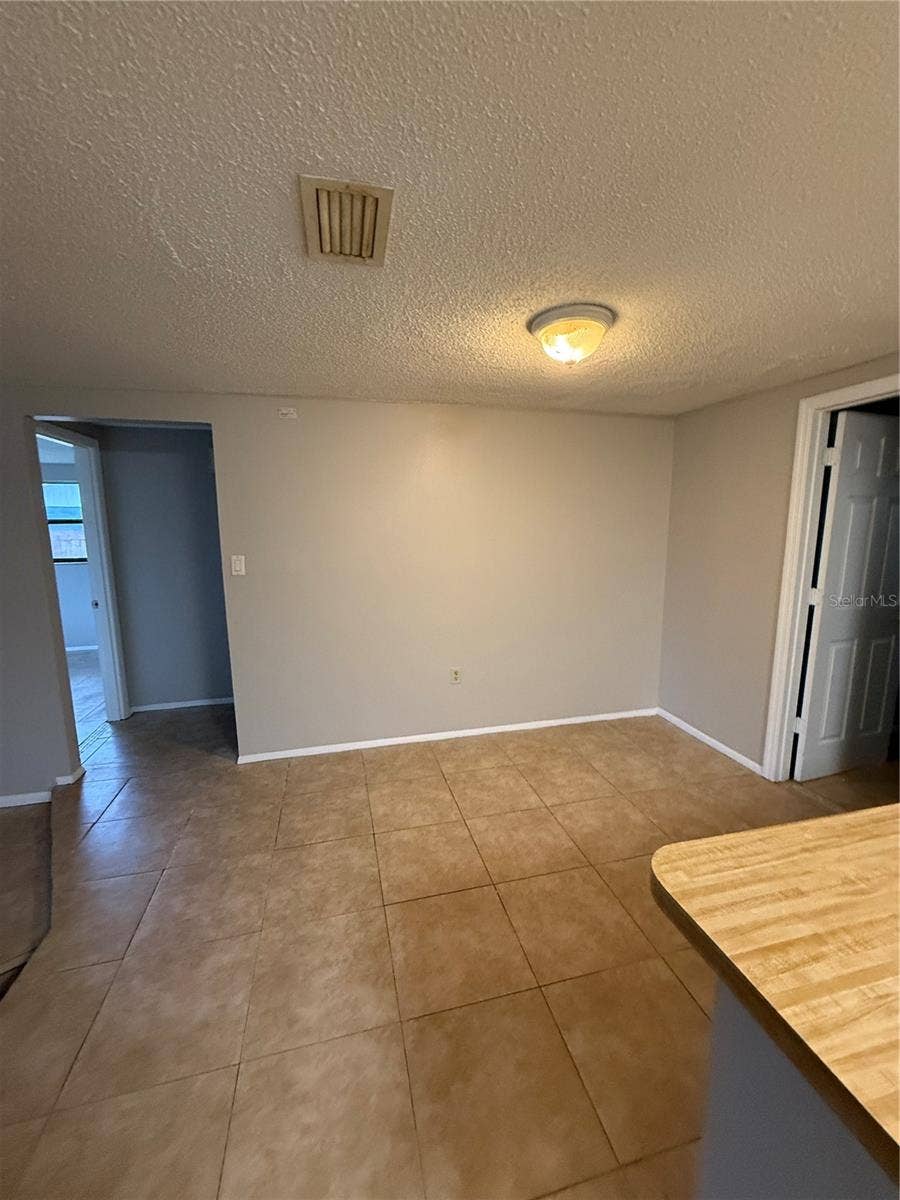 3425 WOODCOCK DRIVE, Holiday, FL 34690