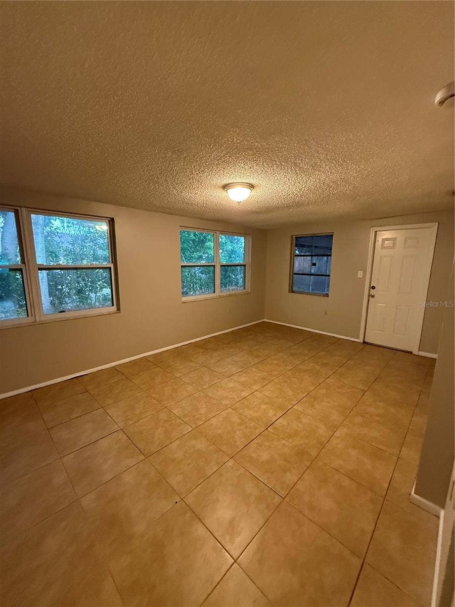 3425 WOODCOCK DRIVE, Holiday, FL 34690