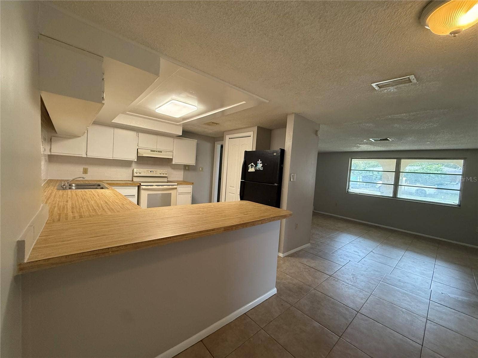 3425 WOODCOCK DRIVE, Holiday, FL 34690